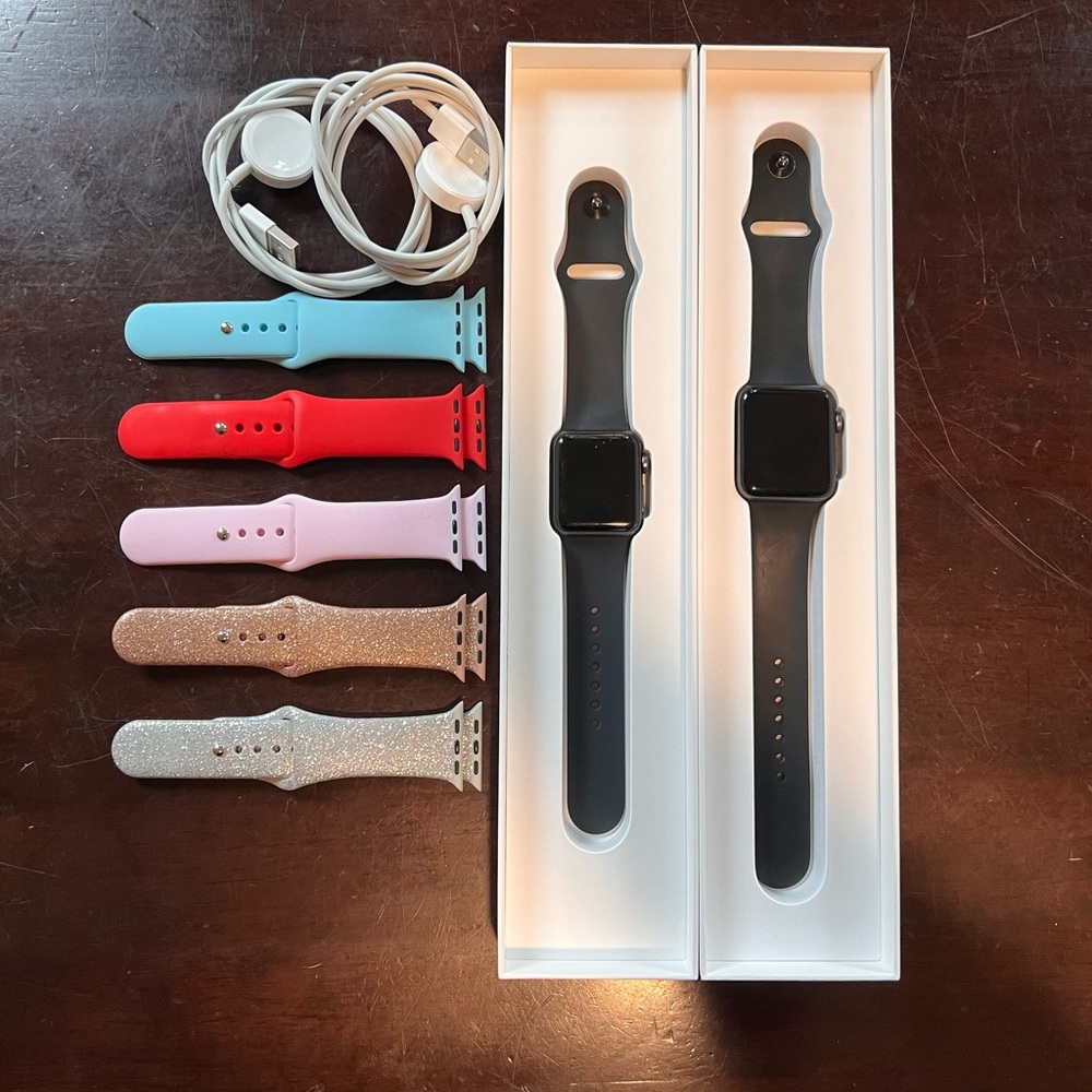 (2) Apple Watches Series 3 - 38mm & 42mm, space gray, including 5 extra bands